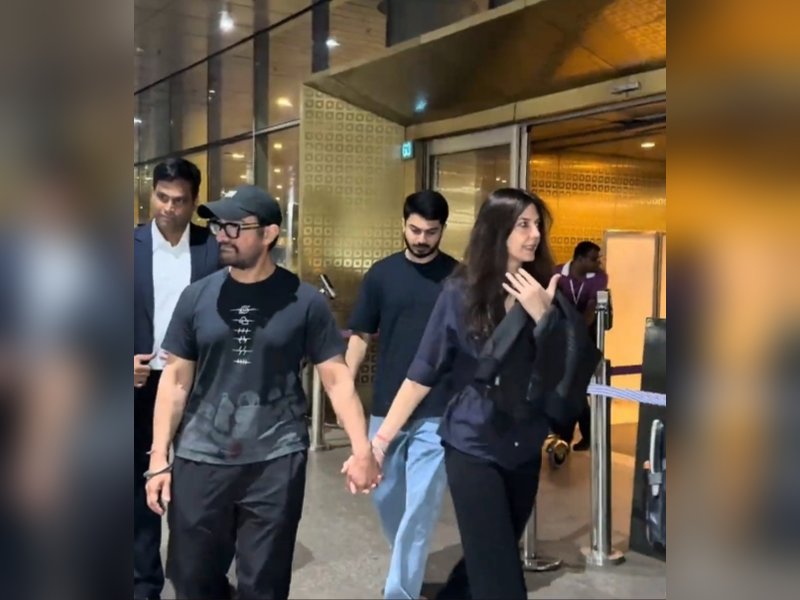 Aamir Khan and to-be-wife Gauri Spratt walk hand in hand at airport ahead of July wedding