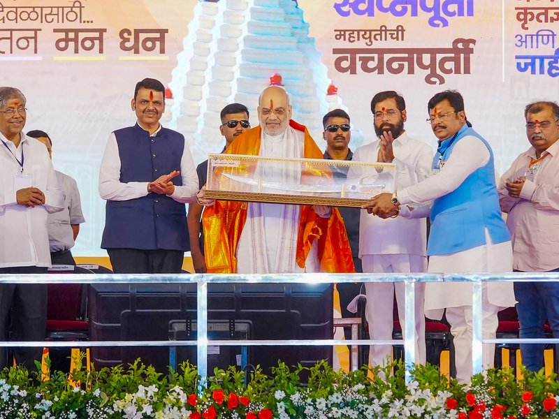 Kolhapur: Union Home and Cooperation Minister Amit Shah, Maharashtra Chief Minister Devendra Fadnavis and Maharashtra Deputy Chief Minister Eknath Shinde attend the Bhavya Krutadnyata Sohala and public meeting organised in support of the Ambabai Temple project in Kolhapur district of Maharashtra on Saturday, June 20, 2026. (Photo: IANS/X/@Devendra_Office)