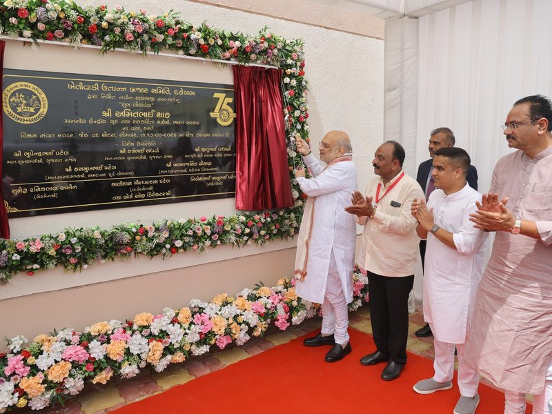 Gujarat: HM Amit Shah inaugurates new vegetable sub-yard at Dahegam APMC (Photo: IANS)