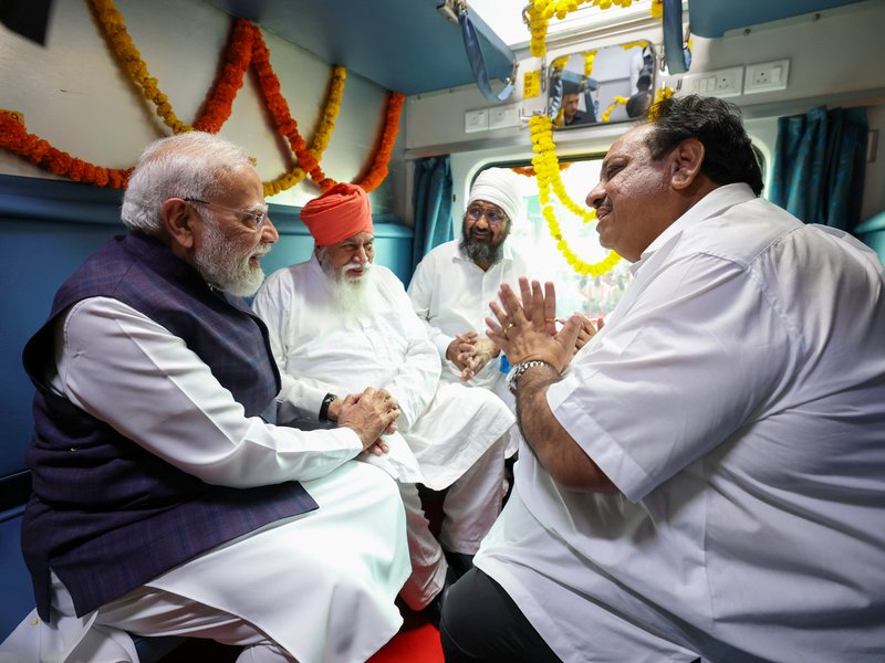Jalandhar: Prime Minister Narendra Modi interacts with students onboard a train after flagging off new train services during the launch of multiple rail and road infrastructure projects in Jalandhar district of Punjab on Friday, July 17, 2026. (Photo: IANS/PMO)