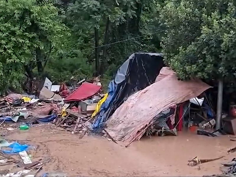 Rajouri: Rubble of damaged structures lies on a road after flash floods triggered by intense rainfall in Rajouri district of Jammu and Kashmir on Sunday, July 19, 2026. (Photo: IANS/Video Grab)