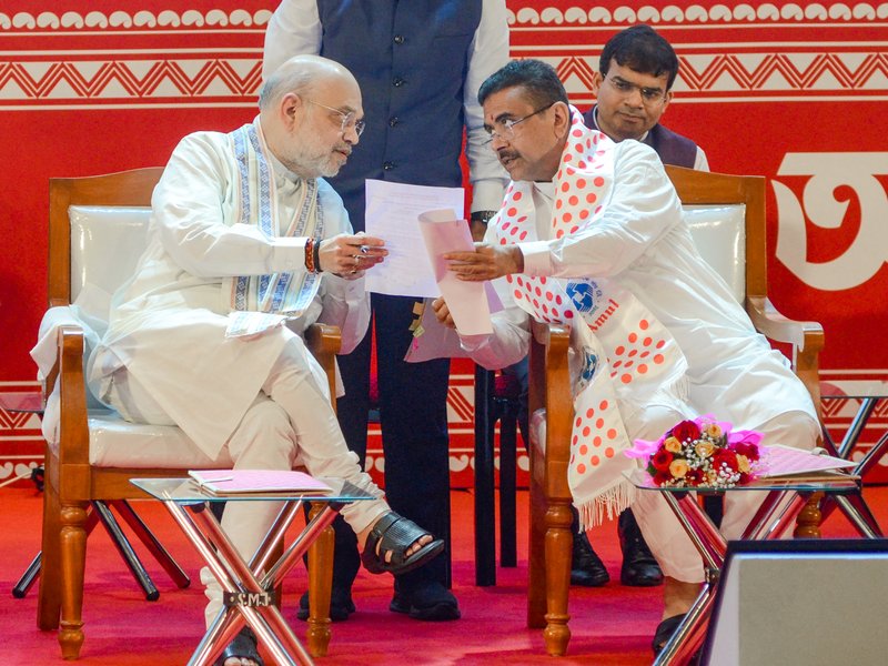 Kolkata: Union Home Minister Amit Shah and West Bengal Chief Minister Suvendu Adhikari during the Bhumi Pujan programme for the construction of Amul's proposed world's largest curd manufacturing unit at the Biswa Bangla Convention Centre, New Town, Kolkata, on Sunday, July 19, 2026. (Photo: IANS/Kuntal Chakrabarty)