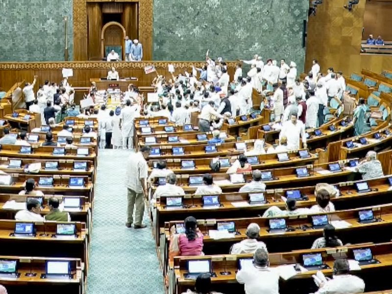 New Delhi: Opposition MPs shout slogans in the Lok Sabha during the monsoon session of Parliament in New Delhi on Monday, July 20, 2026. (Photo: IANS/Sansad TV)
