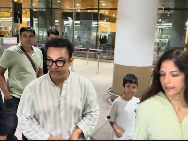 Aamir Khan returns to Mumbai with wife Gauri Spratt, stepson gets confused by paparazzi frenzy at airport