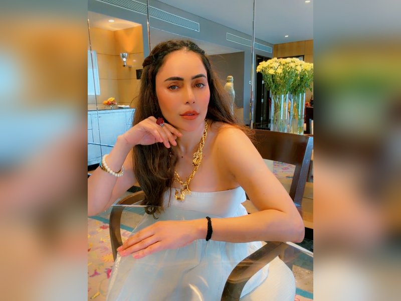 Nikita Rawal gets kissed on the lips by a female fan