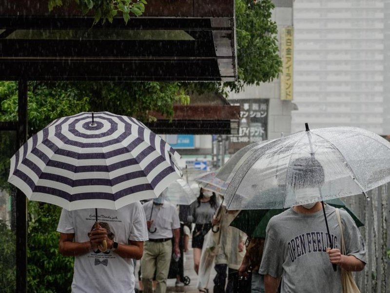 At least six dead as torrential rains trigger widespread flooding in Japan