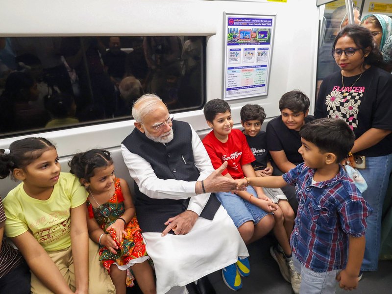 'I want to become like you': Boy whispers into PM Modi's ear during Delhi Metro ride