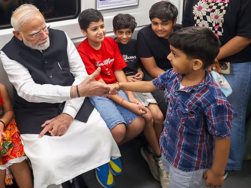 PM Modi attends SRCC centenary celebrations, travels by Metro and releases commemorative coin