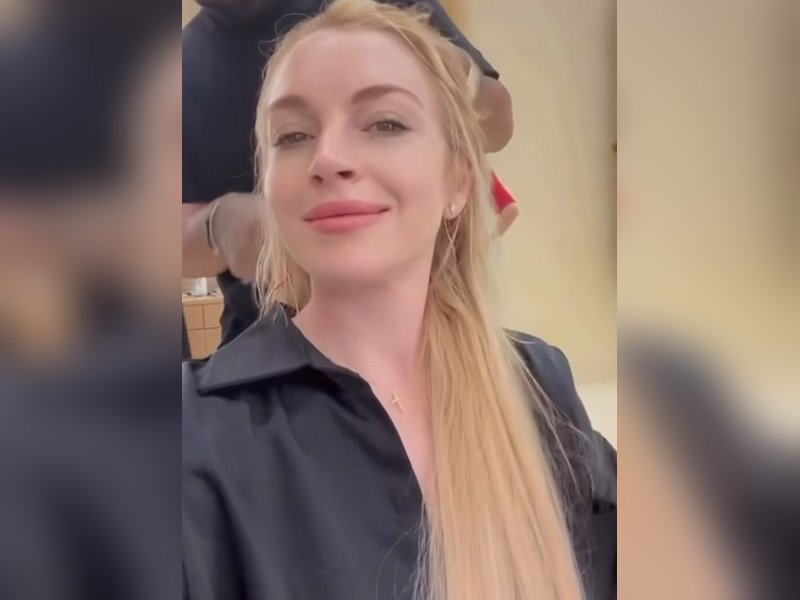 Lindsay Lohan’s hair turns pink while filming ocean scene