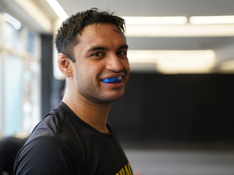 Why did Varun Sanyal pull out of MMA QF at Asian Games?