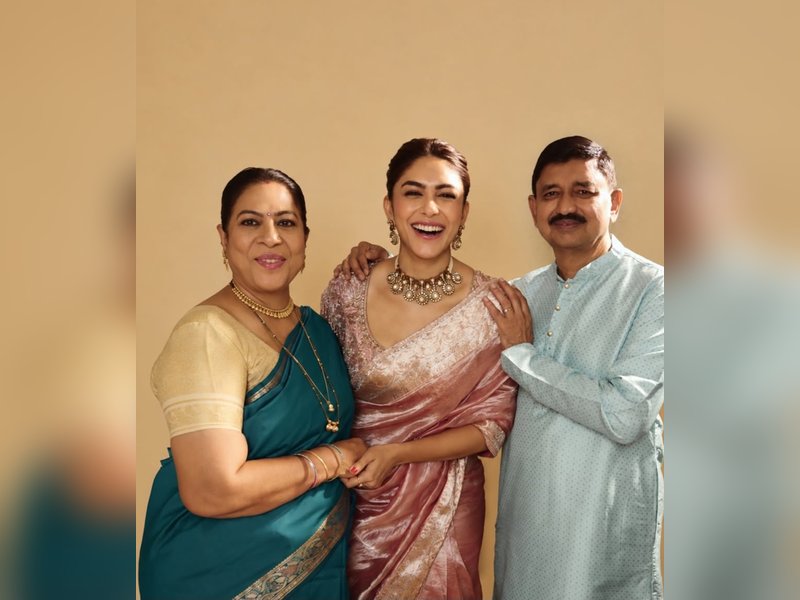 Mrunal Thakur shares family pic with parents, calls herself their ‘beloved daughter