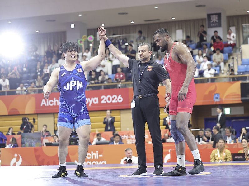 ‘I did it for my father,' says Nitesh Siwach after securing a historic silver for India in Greco-Roman wrestling in the Asian Games 2026 in Nagoya on Thursday. Photo credit: IANS  