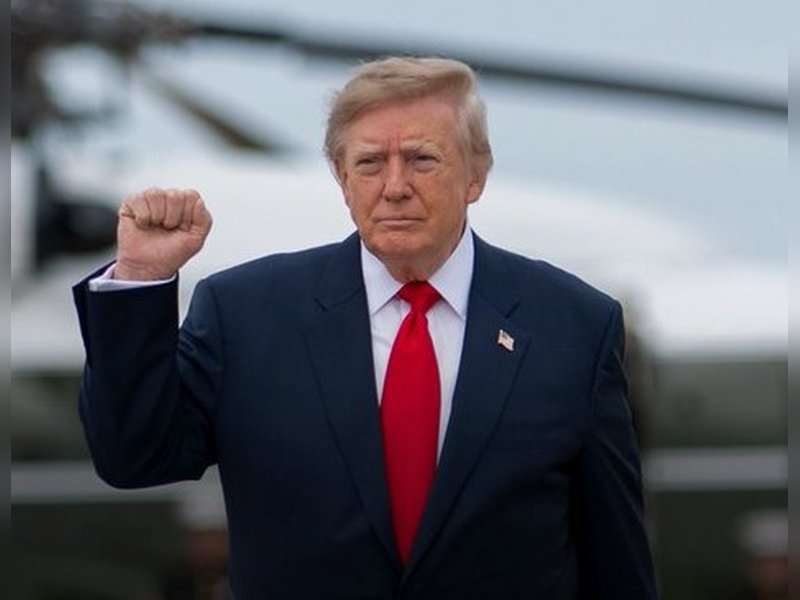 Trump defends Russia sanctions waiver