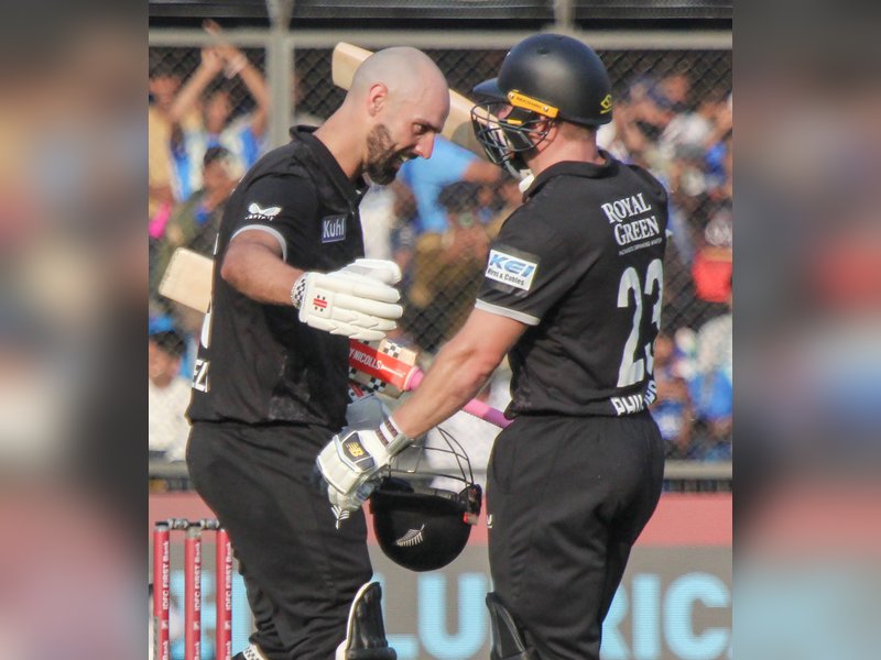 Daryl Mitchell and Glenn Phillips centuries power New Zealand to 337/8 in series decider in Indore on Sunday. Photo credit: IANS