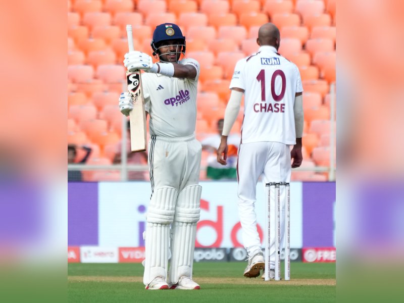 Dhruv Jurel celebrates his maiden Test hundred with an iconic army drill, honouring his father, in the first Test against the West Indies in Ahmedabad on Friday. Photo credit: IANS/X 