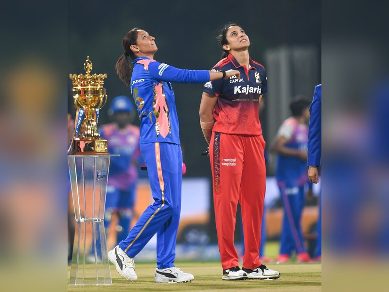 Royal Challengers Bengaluru (RCB) elect to bowl first against defending champions Mumbai Indians, unwell Matthews to miss the opening match of the Women's Premier League (WPL) 2026 at an electrifying DY Patil Stadium in Navi Mumbai on Friday. Photo credit: IANS