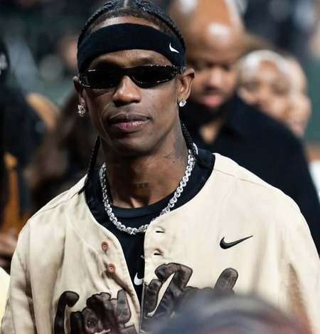 Travis Scott brings daughter Stormi on stage during Tokyo concert Travis Scott brings daughter Stormi on stage during Tokyo concert