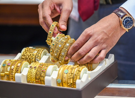 Gold prices slide 1 pc on MCX as Fed Rate cut hopes fade
