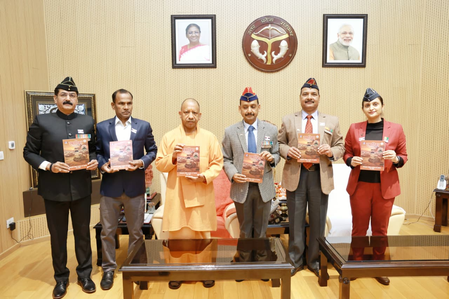 CM Yogi unveils flag pin, souvenir on Armed Forces Flag Day; expresses gratitude to soldiers CM Yogi unveils flag pin, souvenir on Armed Forces Flag Day; expresses gratitude to soldiers
