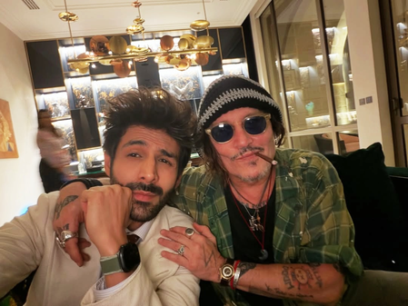 ‘Rooh Baba’ Kartik Aaryan poses for a picture with ‘Jack Sparrow’ Johnny Depp