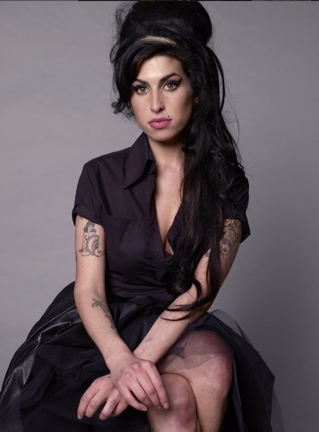 Amy Winehouse's father apologises in court over outburst