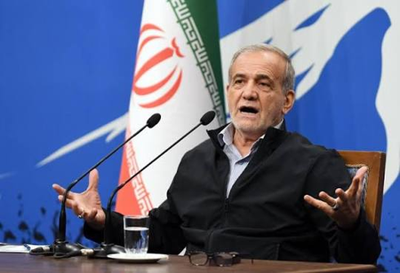 Iran's president says Tehran favors dialogue, but won't be forced to surrender