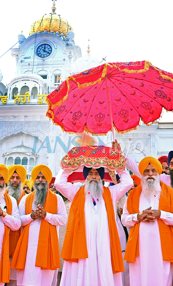 Devotees Carry Guru Granth Sahib